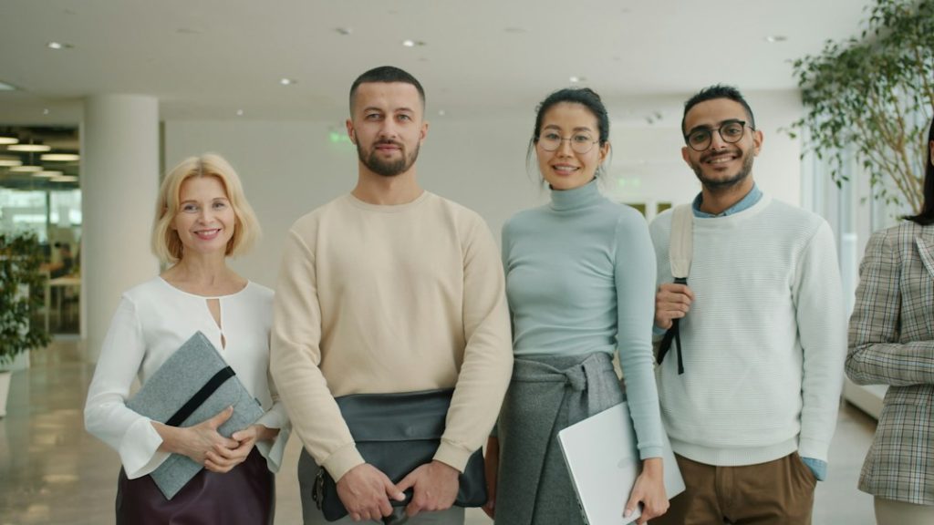 Professional team smiling in a modern office