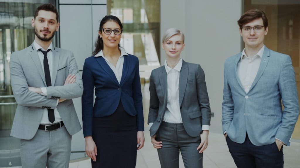 Business team standing together in a modern office
