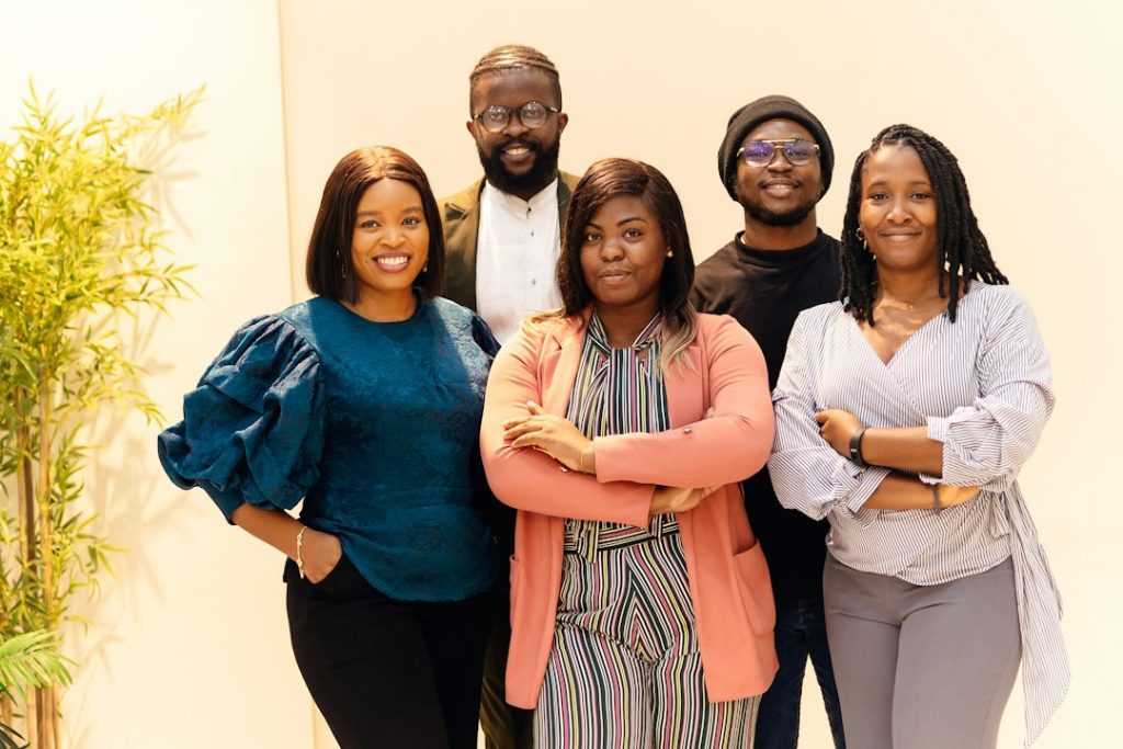 Diverse professionals posing together