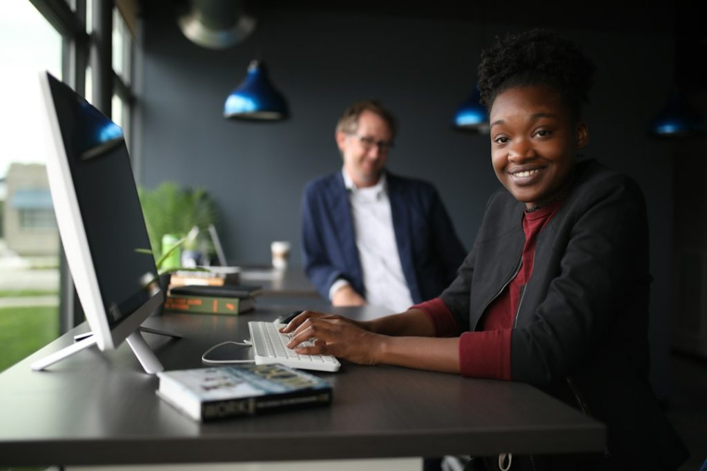 Colleagues collaborating around a desk