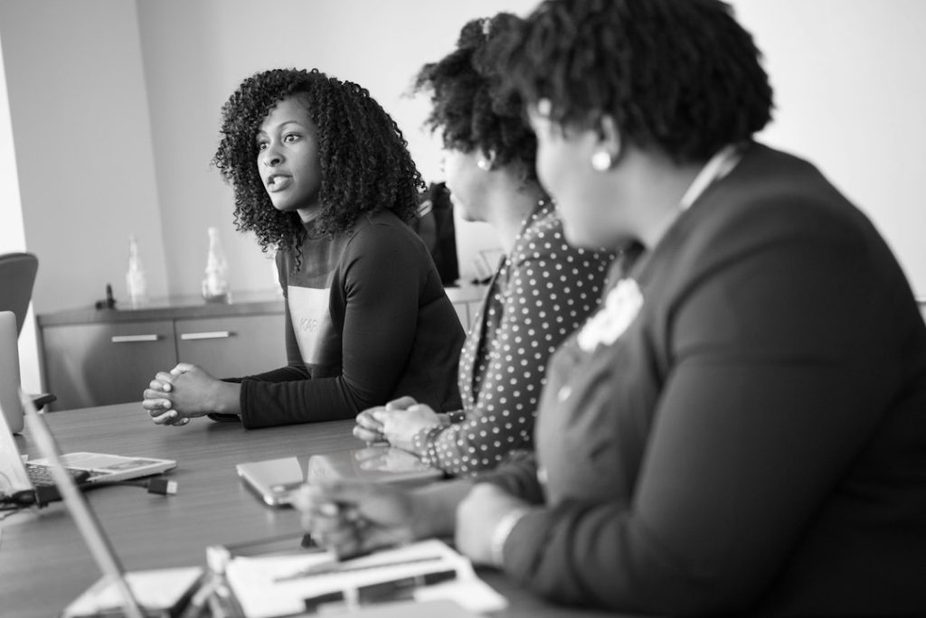 Women collaborating in a workplace discussion